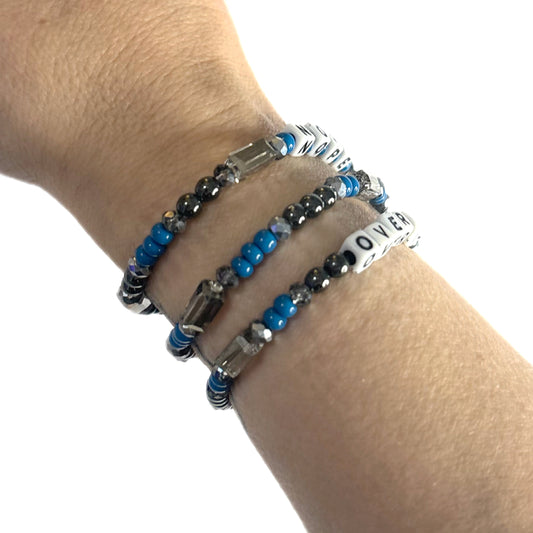 NOPE + OVER IT Bracelet Stack – Hematite & Blue Glass Beads | Hope & Hustle Co.