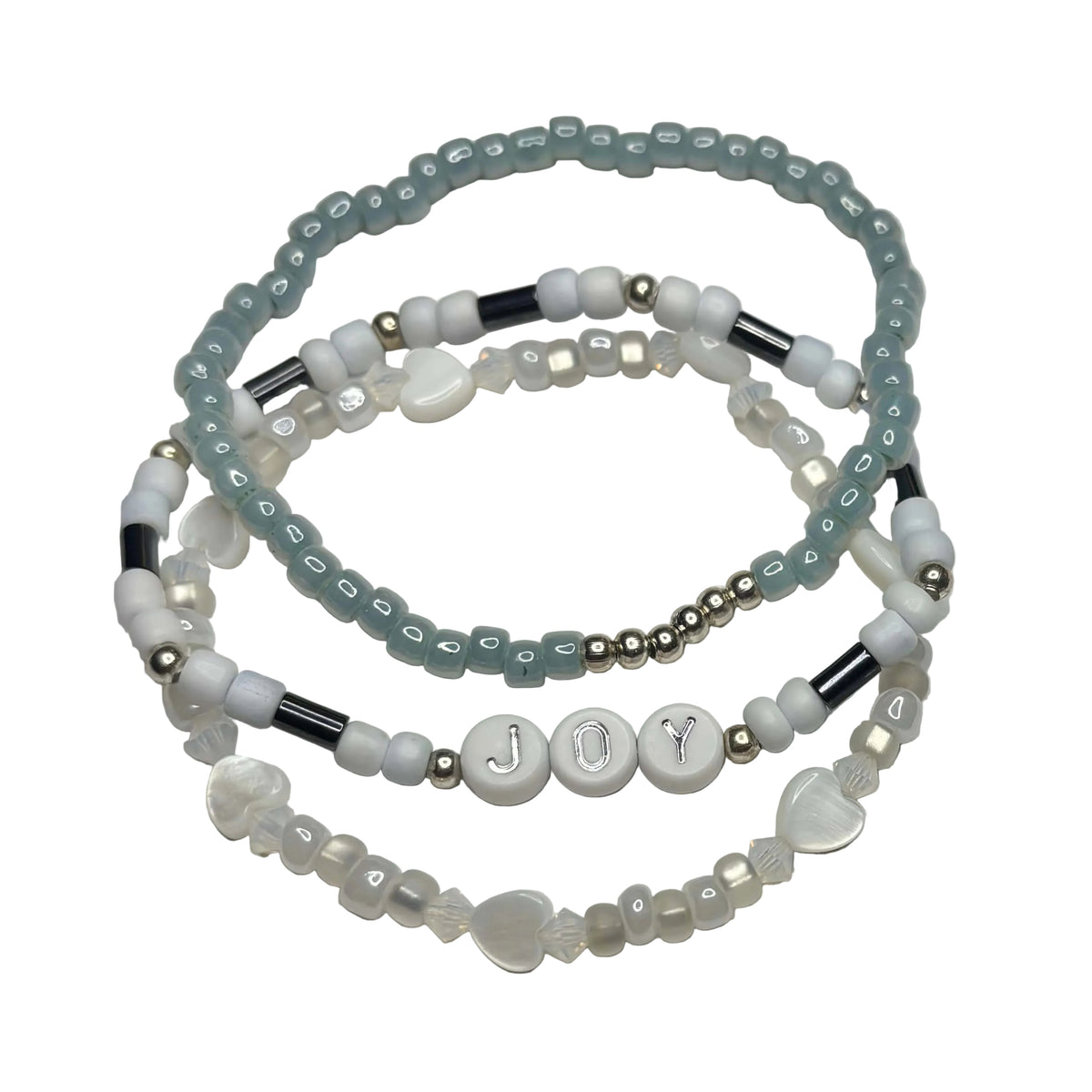 Three-piece Joy bracelet stack with blue glass beads, JOY letter beads, silver accents and white shell hearts.